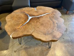 Elm cookie coffee table with live edge and blue epoxy